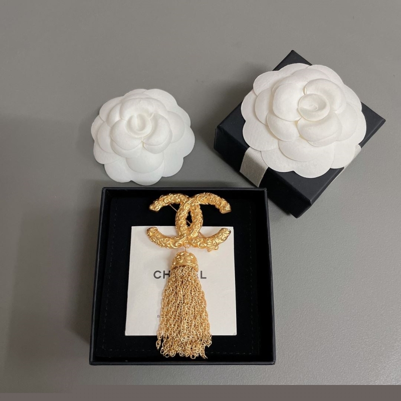 Ch*el brooches